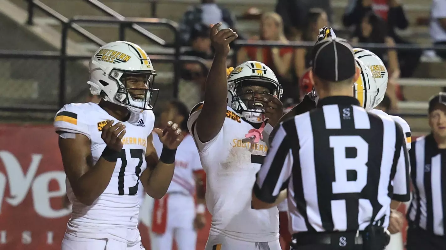Southern Miss Golden Eagles running back Frank Gore Jr. (3) and Southern Miss Golden Eagles quarterback Ethan Crawford (13) celebrate the touchdown in a game between Southern Miss Golden Eagles and Louisiana Ragin Cajuns in the NCAA Basketball Game. November 09, 2023 (Joe Harper/bgnphoto.com)