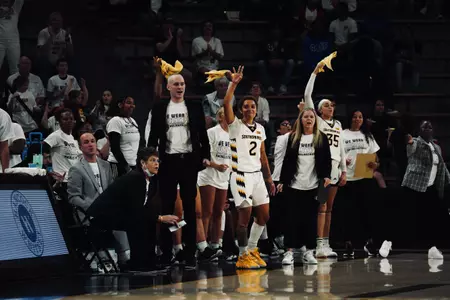 Domonique Davis leads a bench celebration against Ole Miss