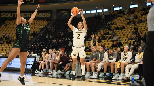 Southern Miss Lady Eagles guard Domonique Davis (2) shoots a three pointer in a game between the Southern Miss Golden Eagles and the Marshall Thundering Herd in a NCAA Women's Basketball game. December 30, 2023. (Joe Harper/bgnphoto.com)