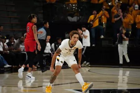 Domonique Davis (2) celebrates a basket against No. 19 Ole Miss