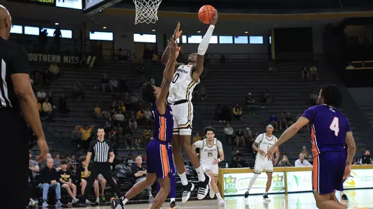 Southern Miss Golden Eagles forward Victor Iwuakor (0) goes up over Northwestern State Demons forward Jimel Lane (0) for the basket in a game between the Southern Miss Golden Eagles vs South Northwestern State in the NCAA Basketball Game. December 9, 2023. (Joe Harper/bgnphoto.com)