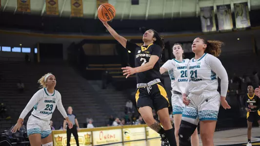Southern Miss Lady Eagles guard Domonique Davis (2) with a lay up in a game between the Southern Miss Golden Eagles and the Costal Carolina . February 10, 2023 (Joe Harper/bgnphoto.com)