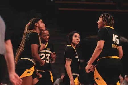 Lady Eagles Celebrate a Melyia Grayson (45) And-One