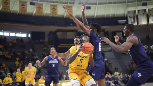 Southern Miss Golden Eagles forward DeAndre Pinckney (5) working hard to get a shot in a game between the Southern Miss Golden Eagles and the Georgia Southern Eagles . February 18, 2023 (Joe Harper/bgnphoto.com)