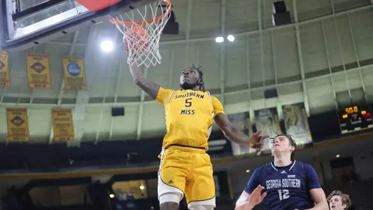 Southern Miss Golden Eagles forward DeAndre Pinckney (5) going strong to the basket in a game between the Southern Miss Golden Eagles and the Georgia Southern Eagles . February 18, 2023 (Joe Harper/bgnphoto.com)