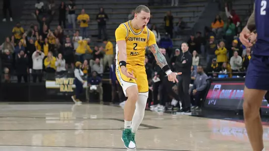 Southern Miss Golden Eagles guard Neftali Alvarez (2) celebrates the three point shot in a game between the Southern Miss Golden Eagles and the Georgia Southern Eagles . February 18, 2023 (Joe Harper/bgnphoto.com)