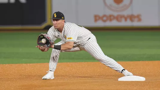 Southern Miss. infielder Gabe Lacy (22) receives the ball to start a double play in a game between the Southern Miss Golden Eagles and the Illinois. February 24, 2023 (Joe Harper/bgnphoto.com)