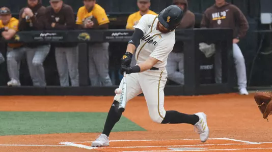 Southern Miss. outfielder Slade Wilks (7) goes yard in a game between the Southern Miss Golden Eagles and Valparaiso. March 12, 2023 (Joe Harper/bgnphoto.com)