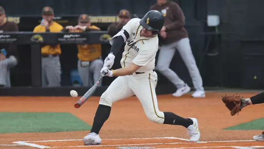Southern Miss. infielder Danny Lynch (26) with a base hit in a game between the Southern Miss Golden Eagles and Valparaiso. March 12, 2023 (Joe Harper/bgnphoto.com)