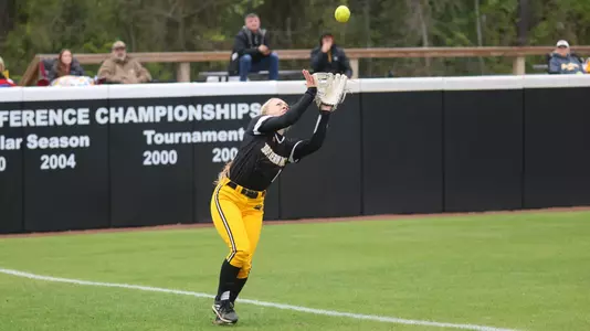 Southern Miss Golden Eagles outfield Caroline Worrell (1) makes a catch in foul territory in left field in a game between the Southern Miss Golden Eagles and the Louisiana Ragin Cajuns March 18, 2023 (Joe Harper/bgnphoto.com)