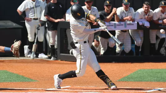 Southern Miss. infielder Dustin Dickerson (10) follows with a base hit in a game between the Southern Miss Golden Eagles and Dallas Baptist University. March 5, 2023 (Joe Harper/bgnphoto.com)