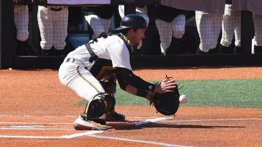 Southern Miss. catcher Blake Johnson (25) receives the throw from Southern Miss. outfielder Carson Paetow (37) in a game between the Southern Miss Golden Eagles and Dallas Baptist University. March 5, 2023 (Joe Harper/bgnphoto.com)
