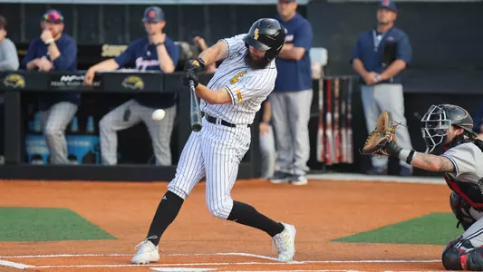 Southern Miss. outfielder Matthew Etzel (3) puts the ball in paly in a game between the Southern Miss Golden Eagles and South Alabama. May 05, 2023 (Joe Harper/bgnphoto.com)