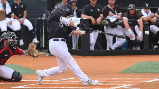 Southern Miss. catcher Rodrigo Montenegro (15) with a double down the right field line in a game between the Southern Miss Golden Eagles and South Alabama. May 07, 2023 (Joe Harper/bgnphoto.com)