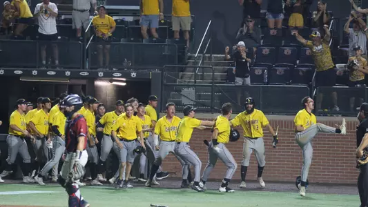 Southern Miss. outfielder Carson Paetow (37) and Southern Miss. pitcher/infielder Nick Monistere (8) celebrate the 2 runs they scored in the 6th inning in a game between the Southern Miss Golden Eagles and Penn Quakers in the NCAA Regional Tournament. June 04, 2023 (Joe Harper/bgnphoto.com)