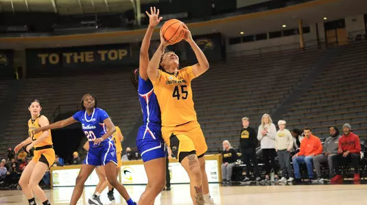 Southern Miss Lady Eagles center Melyia Grayson (45) goes in strong for a layup in a game between the Southern Miss Golden Eagles and the Georgia State Panthers in a NCAA Women's Basketball game. January 11, 2024. (Joe Harper/bgnphoto.com)