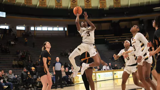Southern Miss Lady Eagles guard Jacorriah Bracey (3) drives the lane for a layup in a game between the Southern Miss Golden Eagles and the UL Monroe Warhawks in a NCAA Women's Basketball game. January 11, 2024. (Joe Harper/bgnphoto.com)