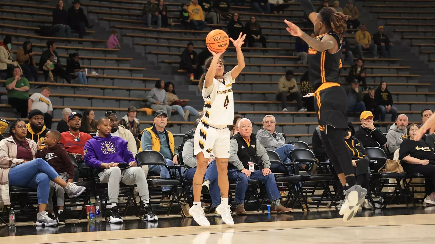 Southern Miss Lady Eagles guard Noelani Cornfield (4) drains a three point shot in a game between the Southern Miss Golden Eagles and the UL Monroe Warhawks in a NCAA Women's Basketball game. January 11, 2024. (Joe Harper/bgnphoto.com)