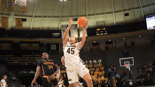 Southern Miss Lady Eagles center Melyia Grayson (45) going up strong to the basket in a game between the Southern Miss Golden Eagles and the UL Monroe Warhawks in a NCAA Women's Basketball game. January 11, 2024. (Joe Harper/bgnphoto.com)
