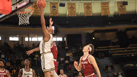 Southern Miss Golden Eagles guard Austin Crowley (1) goes in for a layup in a game between the Southern Miss Golden Eagles and the Troy Trojans in a NCAA Men's Basketball game. January 20, 2024. (Joe Harper/bgnphoto.com)