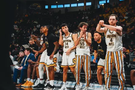 Southern Miss Bench Celebrates during the James Madison game