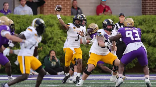 Southern Miss Golden Eagles quarterback Ethan Crawford (3) throws a pass over the middle to Southern Miss Golden Eagles wide receiver Tiaquelin Mims (1) in a NCAA football game between the Southern Miss Golden Eagles and the James Madison Dukes. October 26, 2024. (Joe Harper/bgnphoto.com)