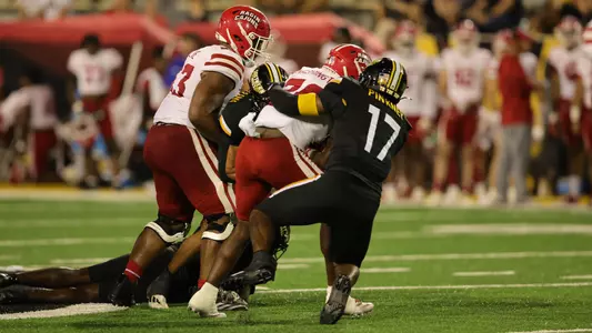 Southern Miss Golden Eagles linebacker Tre Pinkney (17) brings down the Louisiana runner in a NCAA football game between the Southern Miss Golden Eagles and the Louisiana Ragin Cajuns. October 5, 2024. (Joe Harper/bgnphoto.com)