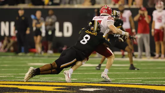 Southern Miss Golden Eagles linebacker Jalil Clemons (8) sacks Louisiana-Lafayette Ragin Cajuns quarterback Ben Wooldridge (10) in a NCAA football game between the Southern Miss Golden Eagles and the Louisiana Ragin Cajuns. October 5, 2024. (Joe Harper/bgnphoto.com)