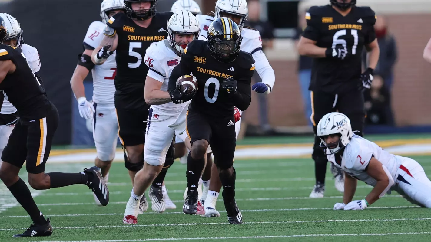 Southern Miss Golden Eagles running back Rodrigues Clark (0) breaks a big run In a game between the Southern Miss Golden Eagles and the South Alabama Jaguars in a NCAA football game. November 23, 2024 (Joe Harper/bgnphoto.com)