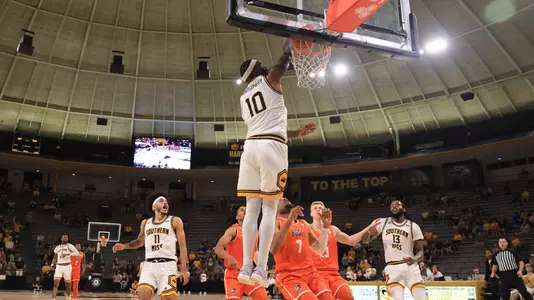 Southern Miss Golden Eagles guard Cobie Montgomery (10) slams it home in a NCAA basketball game between the Southern Miss Golden Eagles and Bowling Green. November 04, 2024. (Joe Harper/bgnphoto.com)
