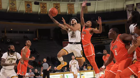 Southern Miss Golden Eagles guard Andre Curbelo (11) drives to the basket in a NCAA basketball game between the Southern Miss Golden Eagles and Bowling Green. November 04, 2024. (Joe Harper/bgnphoto.com)