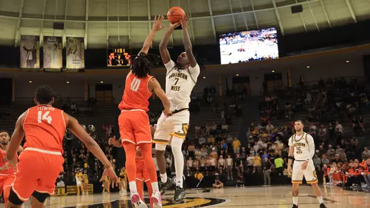 Southern Miss Golden Eagles guard Christian Watson (7) takes a shot over Bowling Green Falcons guard Derrick Butler (10) in a NCAA basketball game between the Southern Miss Golden Eagles and Bowling Green. November 04, 2024. (Joe Harper/bgnphoto.com)