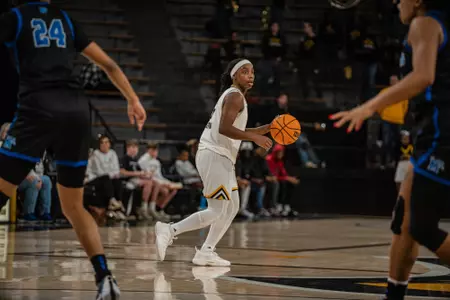 Bre Sutton (5) looks to attack the Memphis defense at Reed Green Coliseum