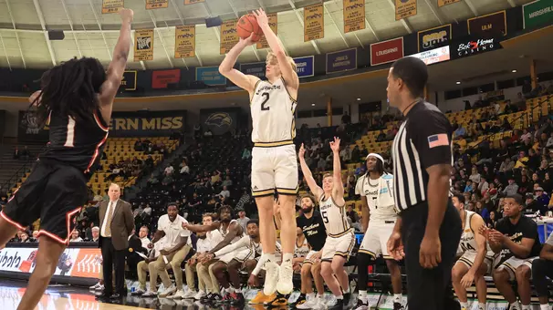 Southern Miss Golden Eagles guard Brewer Carruth (2) shoots a three point shot In a game between the Southern Miss Golden Eagles and the William Carey Crusaders in a NCAA Men’s basketball  game. December 30, 2024 (Joe Harper/bgnphoto.com)