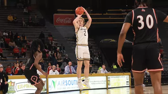 Southern Miss Golden Eagles guard Brewer Carruth (2) with a three point shot In a game between the Southern Miss Golden Eagles and the William Carey Crusaders in a NCAA Men’s basketball  game. December 30, 2024 (Joe Harper/bgnphoto.com)