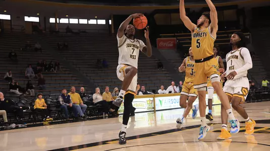 Southern Miss Golden Eagles guard Christian Watson (7) going strong to the basket In a game between the Southern Miss Golden Eagles and the Mississippi Valley State in a NCAA Men’s basketball game. December 05, 2024 (Joe Harper/bgnphoto.com)