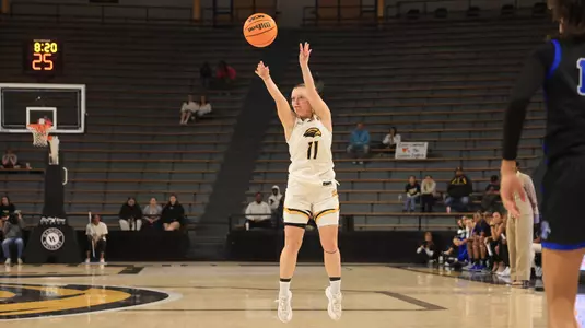 Southern Miss Lady Eagles guard Trinity Rowe (11) shoots a three point shot In a game between the Southern Miss Golden Eagles and the Memphis Tigers in a NCAA Women’s basketball game. December 08, 2024 (Joe Harper/bgnphoto.com)