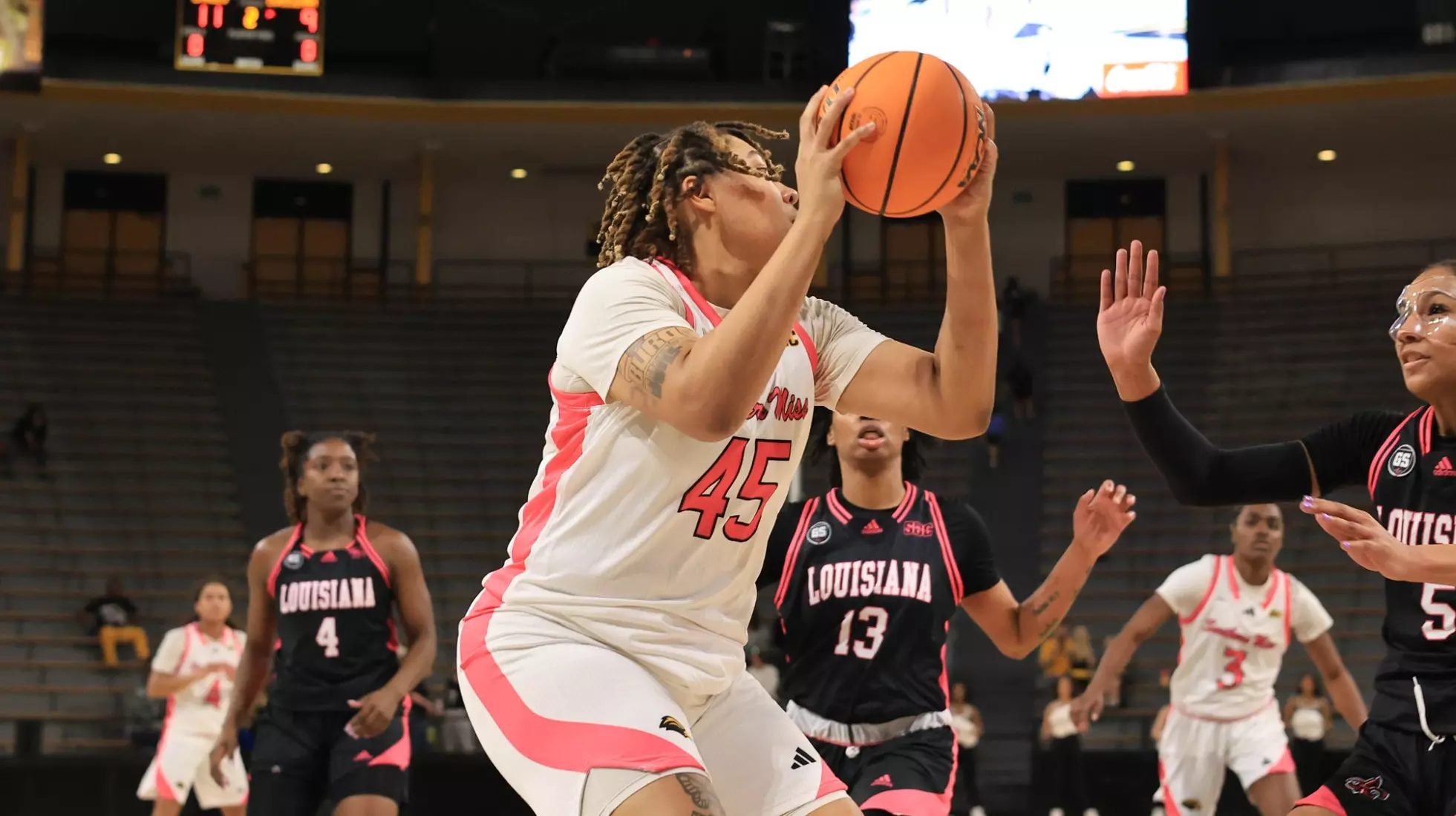 Southern Miss Lady Eagles center Melyia Grayson (45) going up under the basket in a game between the Southern Miss Golden Eagles and the Louisiana Ragin Cajuns in a NCAA Women's Basketball game. February 01, 2024. (Joe Harper/bgnphoto.com)