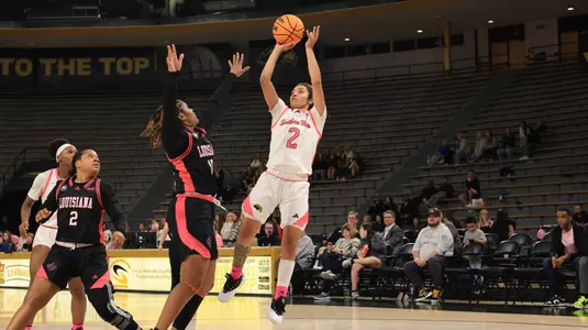 Southern Miss Lady Eagles guard Domonique Davis (2) takes a shot over Louisiana Ragin' Cajuns guard Aasia Sam (10) in a game between the Southern Miss Golden Eagles and the Louisiana Ragin Cajuns in a NCAA Women's Basketball game. February 01, 2024. (Joe Harper/bgnphoto.com)