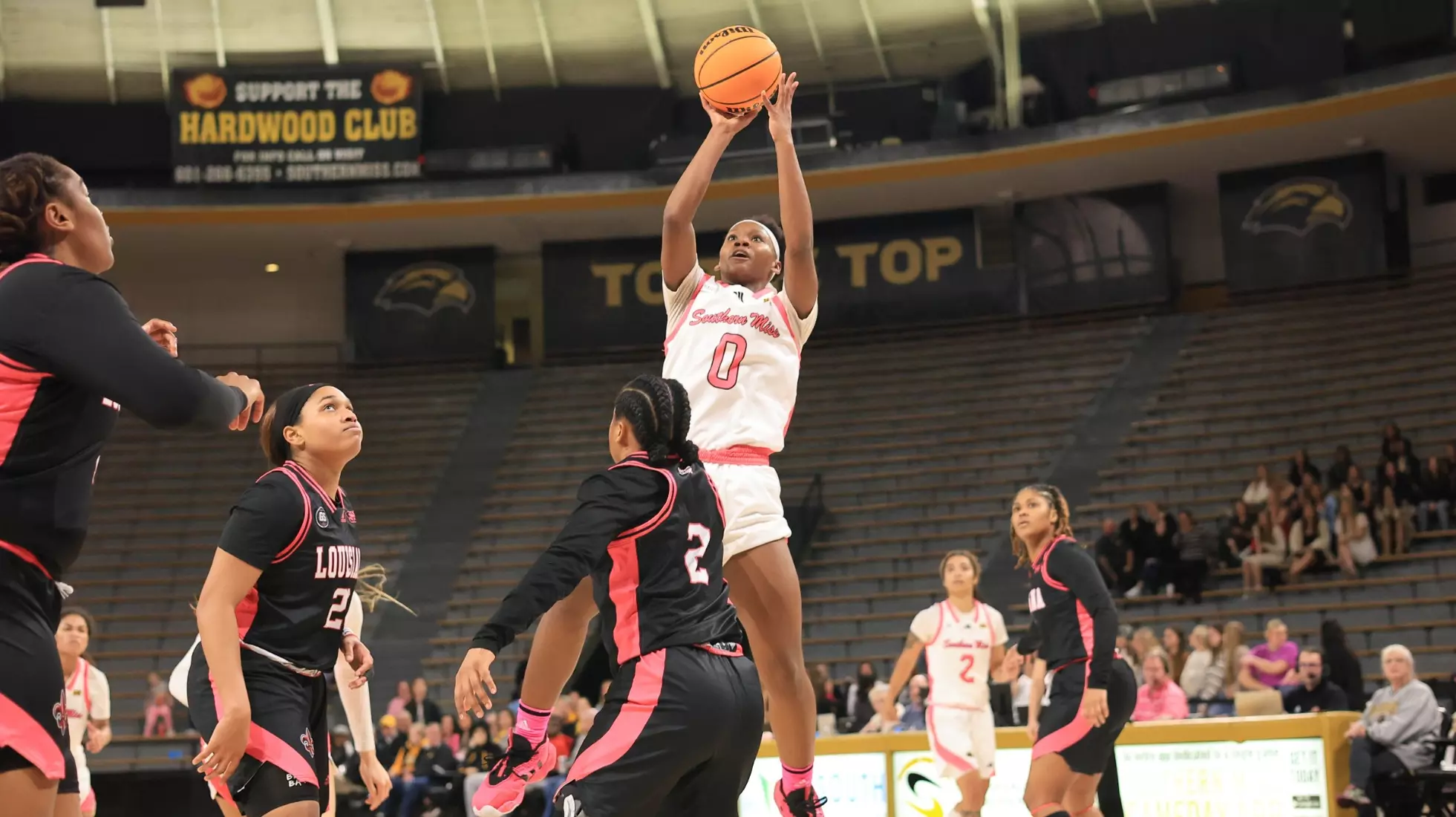 Southern Miss Lady Eagles guard Brikayla Gray (0) takes a shot over Louisiana Ragin' Cajuns guard Brandi Williams (2) in a game between the Southern Miss Golden Eagles and the Louisiana Ragin Cajuns in a NCAA Women's Basketball game. February 01, 2024. (Joe Harper/bgnphoto.com)