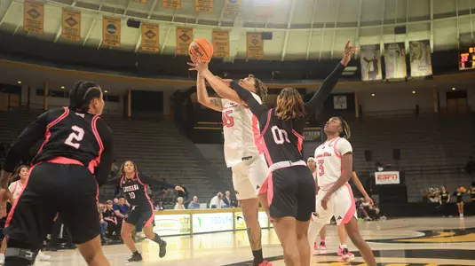 Southern Miss Lady Eagles center Melyia Grayson (45) gets fouled while going in for a layup in a game between the Southern Miss Golden Eagles and the Louisiana Ragin Cajuns in a NCAA Women's Basketball game. February 01, 2024. (Joe Harper/bgnphoto.com)