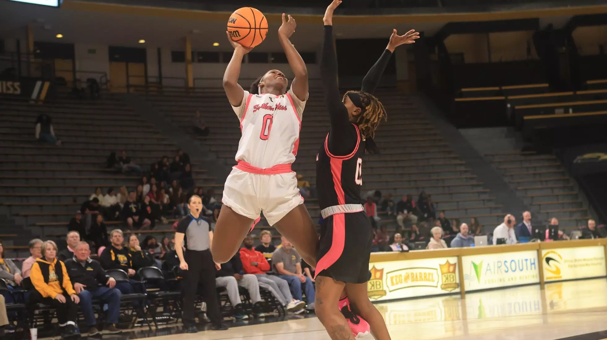 Southern Miss Lady Eagles guard Brikayla Gray (0) with a shot over Louisiana Ragin' Cajuns forward Ashlyn Jones (00) in a game between the Southern Miss Golden Eagles and the Louisiana Ragin Cajuns in a NCAA Women's Basketball game. February 01, 2024. (Joe Harper/bgnphoto.com)