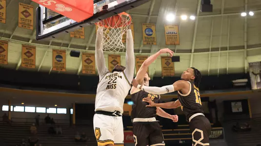 Southern Miss Golden Eagles center Tegra Izay (22) with a monster dunk in a game between the Southern Miss Golden Eagles and the Western Michigan Broncos in a NCAA Men's Basketball game. February 10, 2024. (Joe Harper/bgnphoto.com)