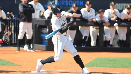 Southern Miss. infielder Gabe Broadus (27) puts the ball in play in a game between the Southern Miss Golden Eagles and the Marist Red Fox in a NCAA Baseball game. February 18, 2024. (Joe Harper/bgnphoto.com)