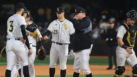Southern Miss. pitcher Niko Mazza (23) talks with Southern Miss head coach Christian Ostrander in a game between the Southern Miss Golden Eagles and the Indiana State Sycamores in a NCAA Baseball game. March 1 , 2024. (Joe Harper/bgnphoto.com)