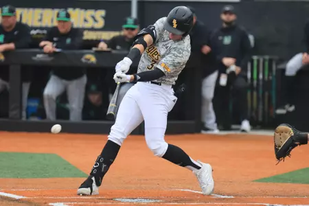 Southern Miss. outfielder Carson Paetow (37) puts the ball in play in a game between the Southern Miss Golden Eagles and the Marshall Thundering Herd in a NCAA Baseball game. March 17 , 2024. (Joe Harper/bgnphoto.com)