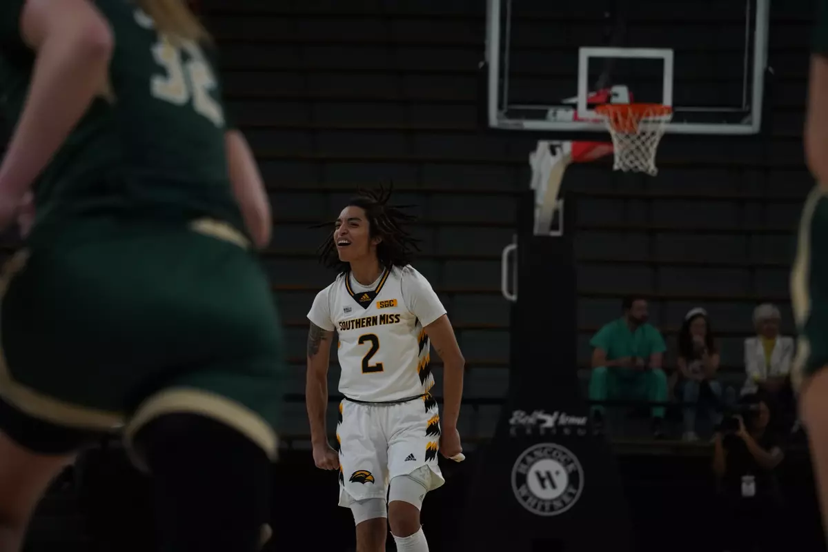 Domonique Davis (2) celebrates against UAB in the WNIT