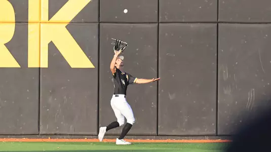 Southern Miss. pitcher Dalton McIntyre (14) makes a catch in center field in a game between the Southern Miss Golden Eagles and the Tulane Green Wave in a NCAA Baseball game. March 26 , 2024. (Joe Harper/bgnphoto.com)