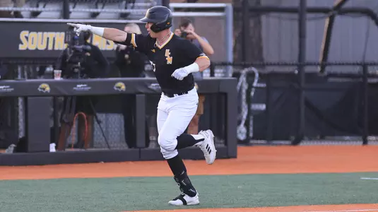 Southern Miss. outfielder Carson Paetow (37) points to the dugout in celebration after the home run in a game between the Southern Miss Golden Eagles and the Tulane Green Wave in a NCAA Baseball game. March 26 , 2024. (Joe Harper/bgnphoto.com)