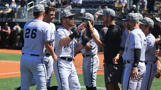 Southern Miss. outfielder Slade Wilks (7) congratulated after a strong throw from right to record the third out in a NCAA Baseball game between the Southern Miss Golden Eagles and the Louisiana Monroe Warhawks. April 21,024. (Joe Harper/bgnphoto.com)